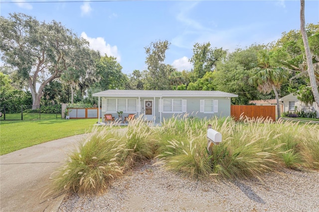 view of front of property with a front lawn