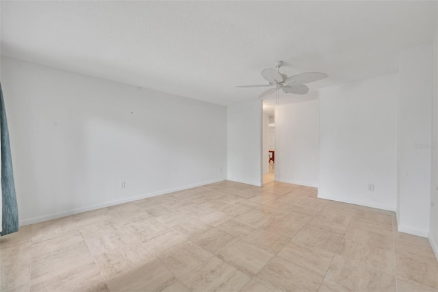 unfurnished room featuring ceiling fan