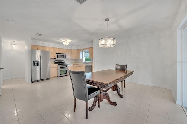 view of tiled dining room