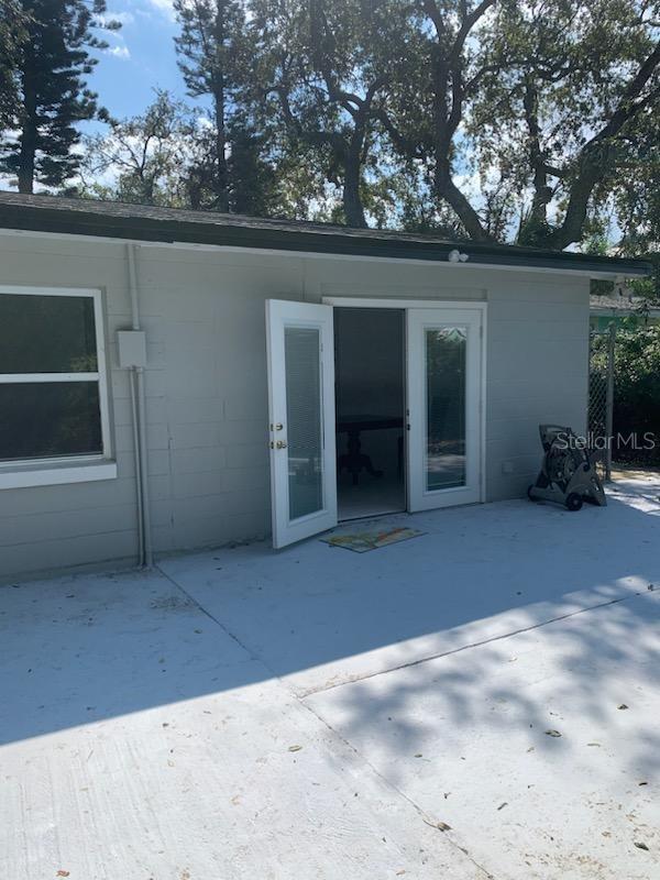 rear view of house featuring a patio