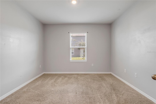 unfurnished room with carpet