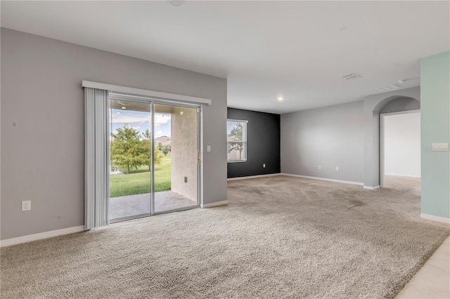 view of carpeted spare room