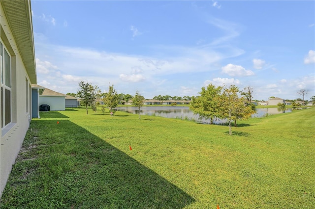 view of yard with a water view