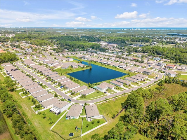 bird's eye view with a water view