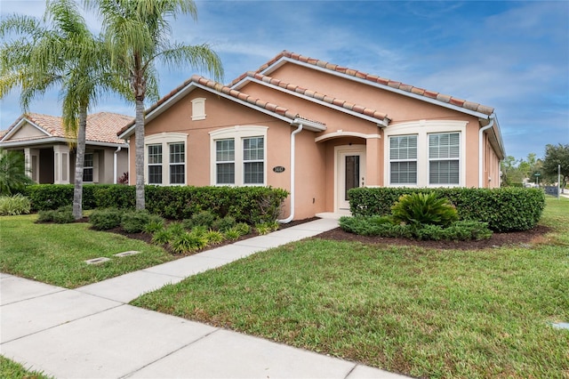 view of front of home with a front yard