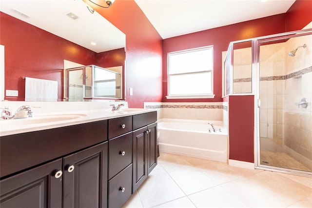 bathroom featuring separate shower and tub, tile patterned floors, and vanity