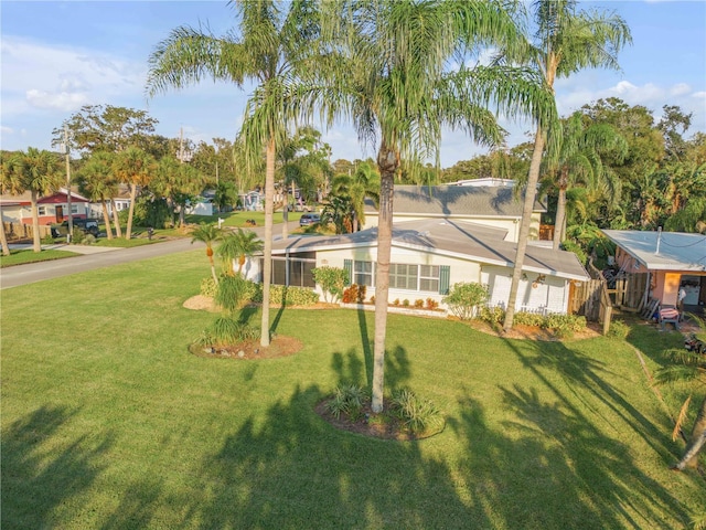 view of front of home with a front yard