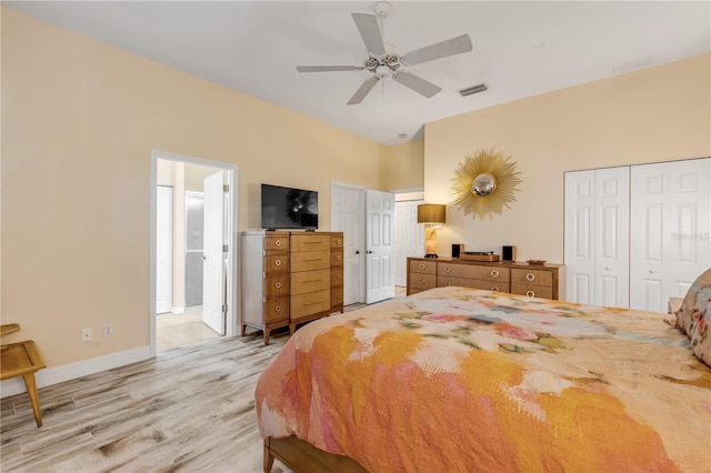 bedroom with light hardwood / wood-style flooring and ceiling fan