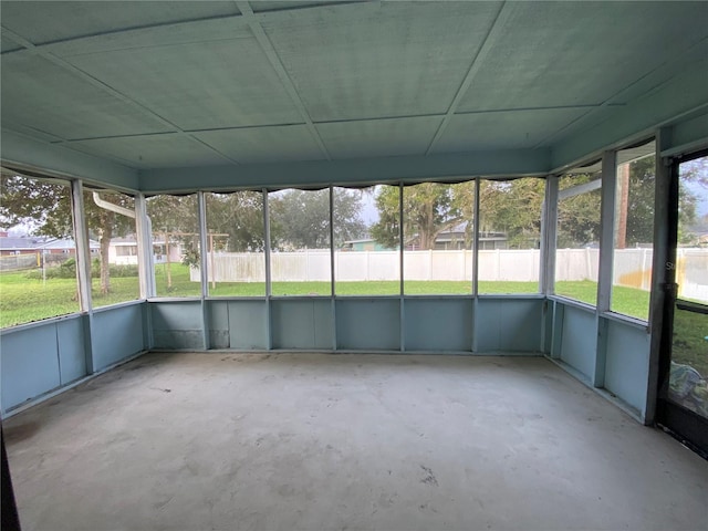 unfurnished sunroom with a healthy amount of sunlight