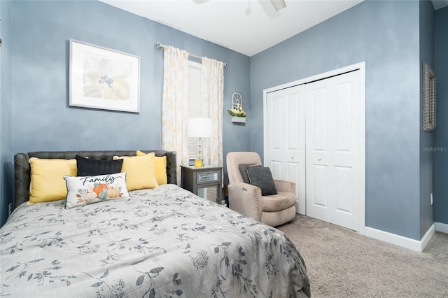 bedroom with a closet, ceiling fan, and carpet floors