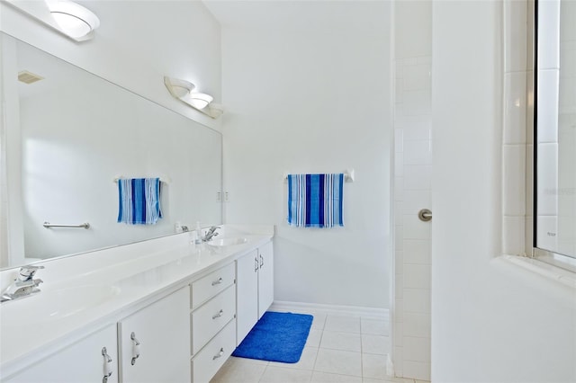 bathroom with vanity and tile patterned floors