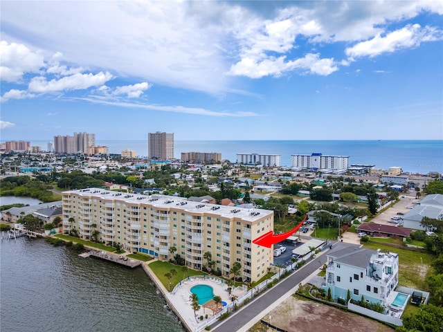 birds eye view of property featuring a water view