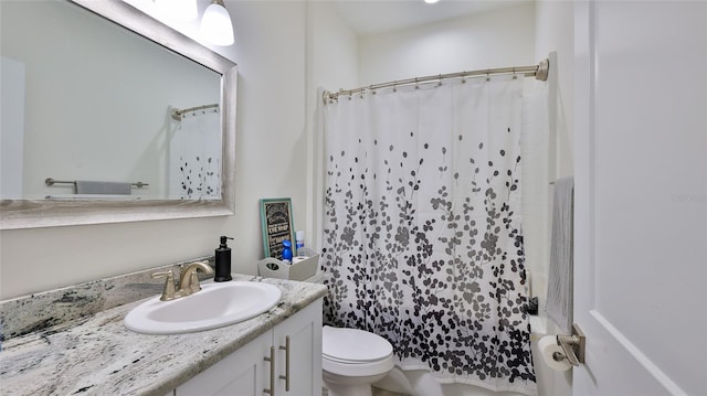 full bathroom with toilet, shower / bath combo, and vanity