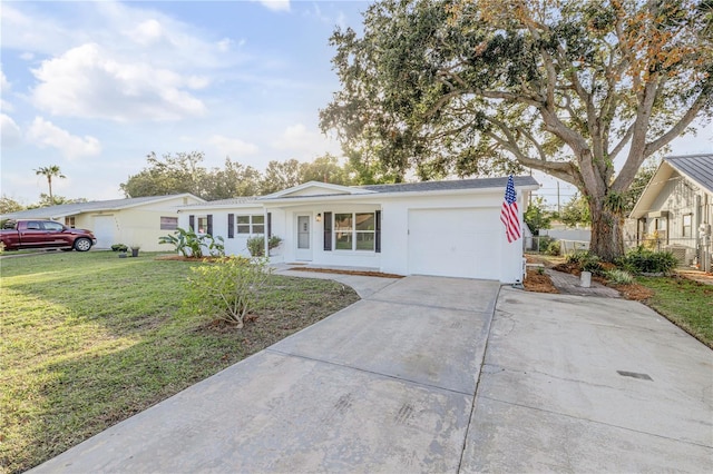 ranch-style house with a front lawn and a garage