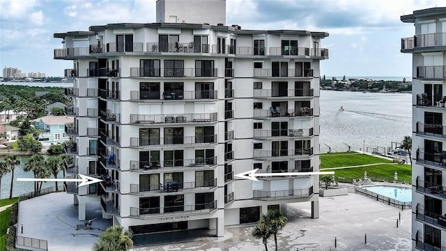 view of building exterior with a water view