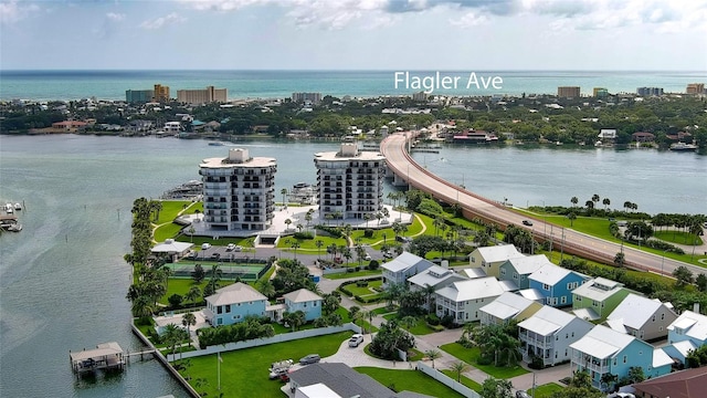 aerial view featuring a view of city and a water view