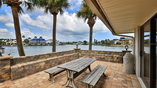 view of patio / terrace featuring a water view