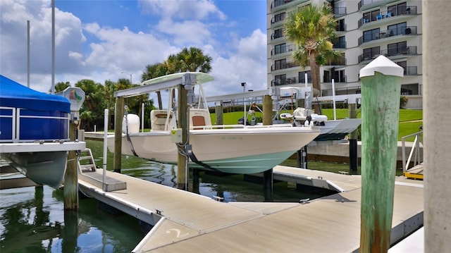 view of dock featuring a water view and boat lift