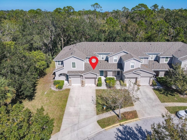 679 Mount Olympus Blvd, New Smyrna Beach, FL 32168 - view of subject property featuring a heavily wooded area