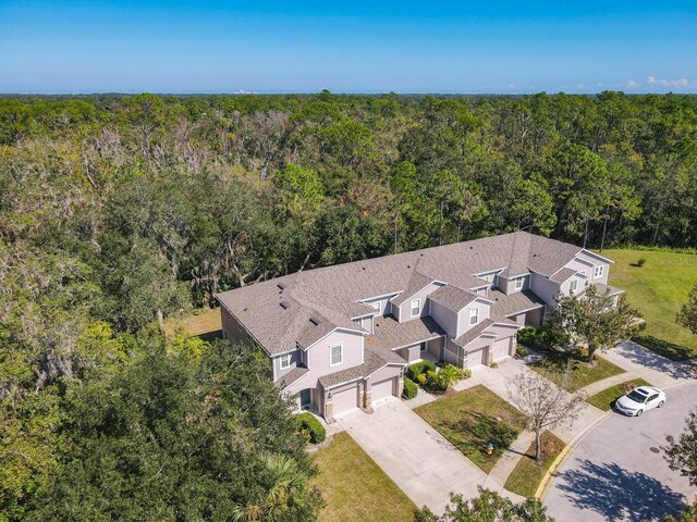 679 Mount Olympus Blvd, New Smyrna Beach, FL 32168 - view from above of property featuring a forest