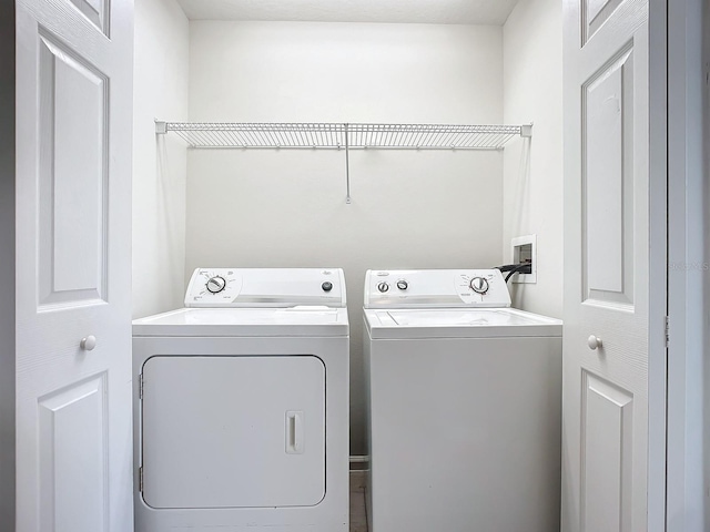 679 Mount Olympus Blvd, New Smyrna Beach, FL 32168 - washroom with washer and dryer
