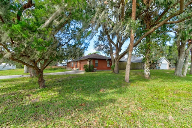 view of yard with a garage