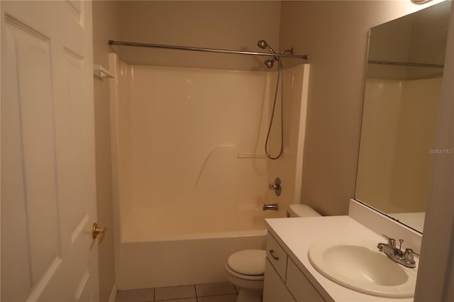 full bathroom with vanity, toilet, tile patterned flooring, and shower / bathtub combination