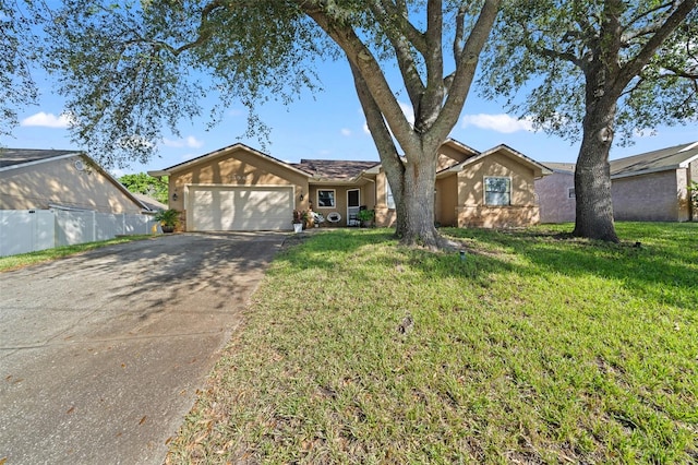 ranch-style home with a front yard and a garage