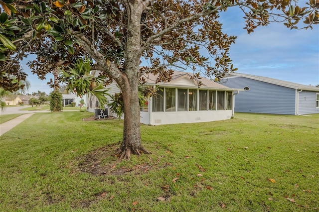 exterior space featuring a sunroom