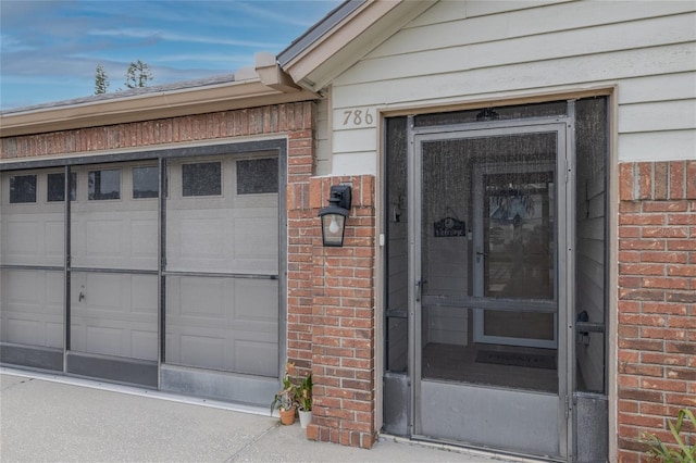 property entrance featuring a garage