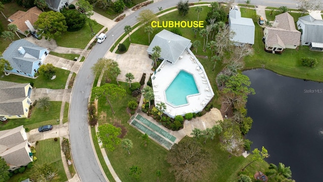 birds eye view of property with a water view