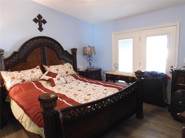 bedroom with wood-type flooring