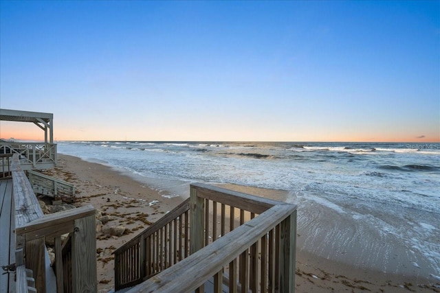 view of water feature with a beach view