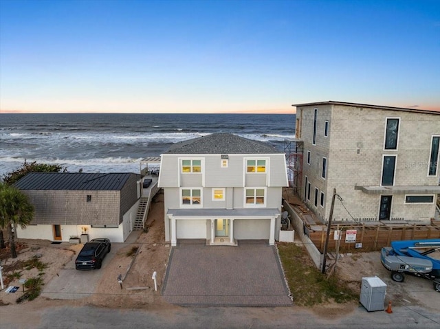 exterior space with a water view