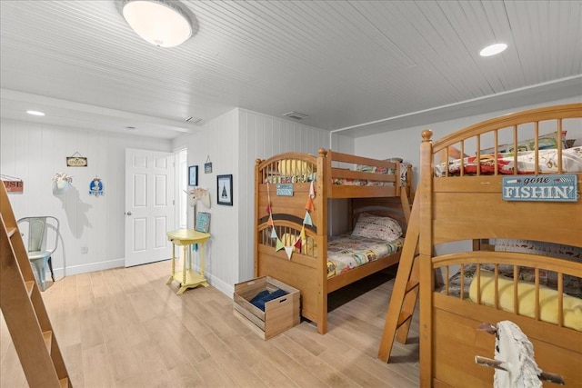 bedroom with hardwood / wood-style floors