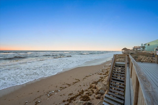 property view of water featuring a beach view