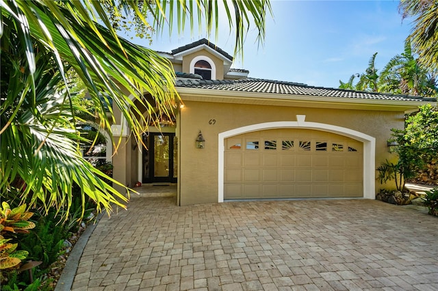 view of front of home featuring a garage