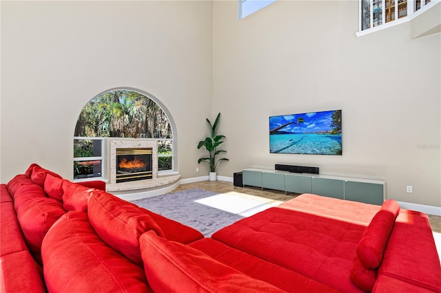 living room with a high ceiling