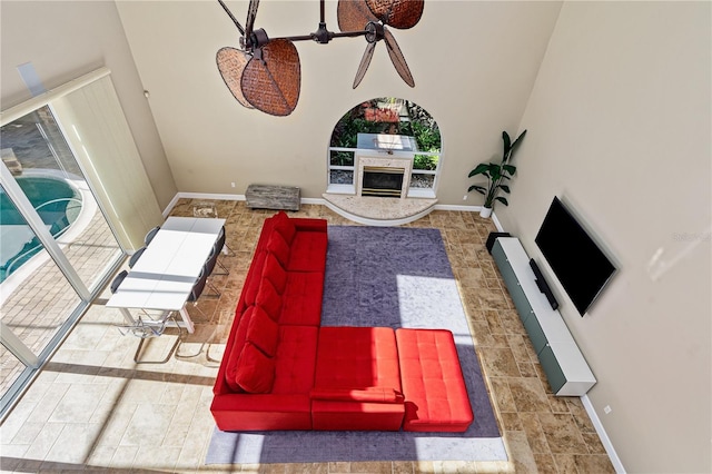 living room with a high ceiling