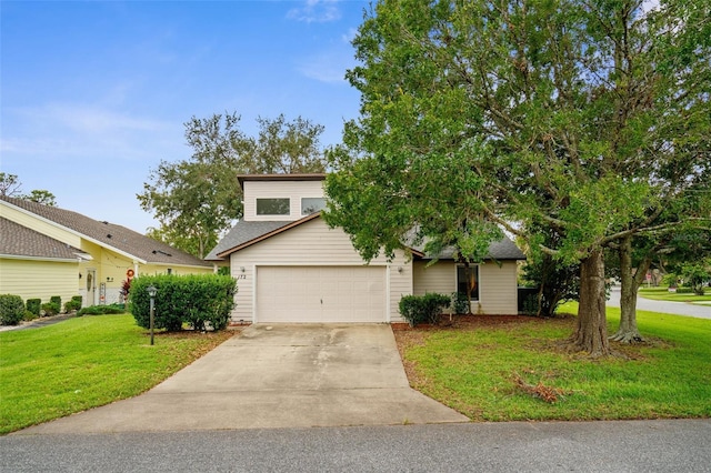 view of front of house featuring a garage and a front lawn