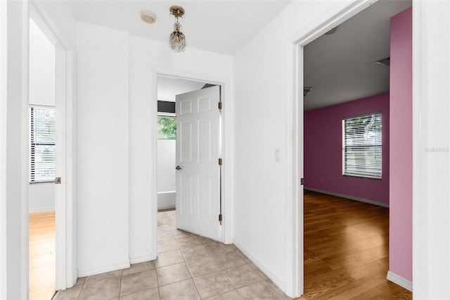 hall featuring light hardwood / wood-style flooring