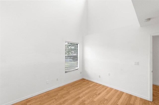 172 Gull Dr S, Daytona Beach, FL 32119 - spare room with light wood-style flooring, baseboards, and a smoke detector