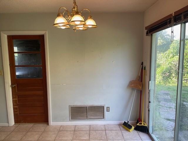 spare room with light tile patterned floors