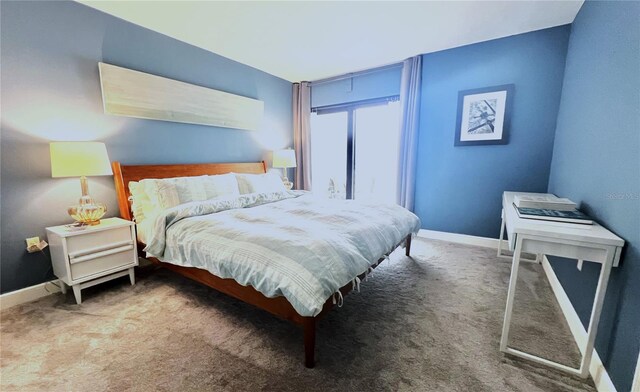 5207 S Atlantic Ave Unit 0622, New Smyrna Beach, FL 32169 - carpeted bedroom with baseboards