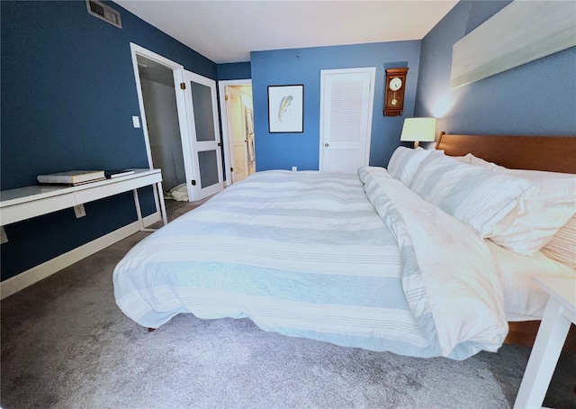 carpeted bedroom with a closet