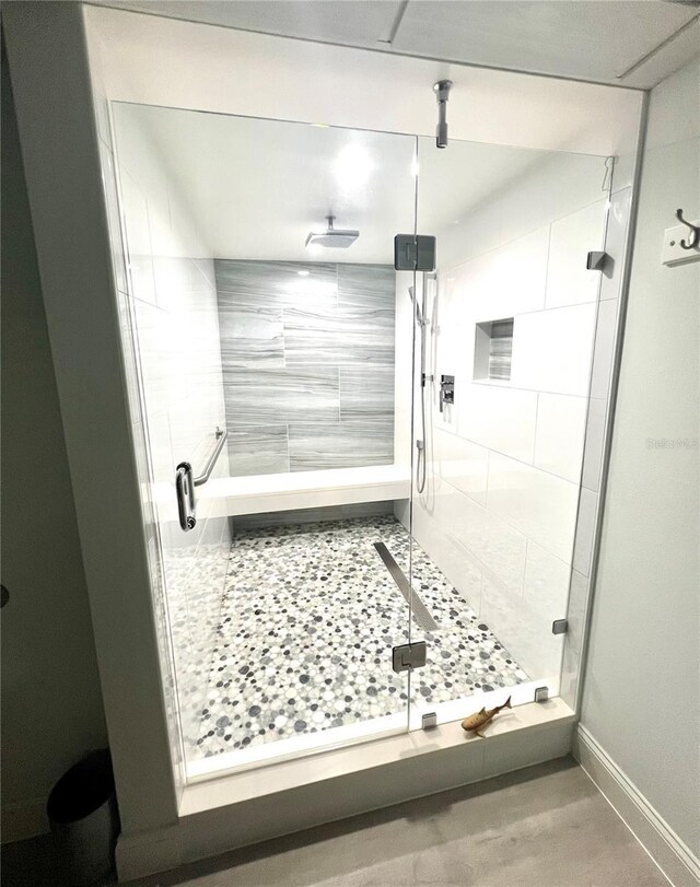 5207 S Atlantic Ave Unit 0622, New Smyrna Beach, FL 32169 - full bath featuring baseboards and a shower stall