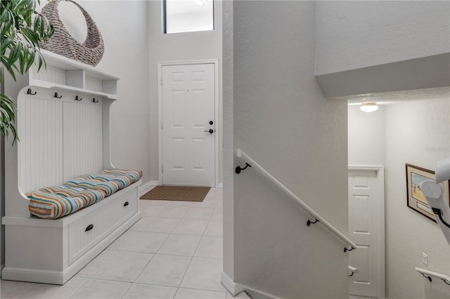 mudroom featuring light tile patterned flooring