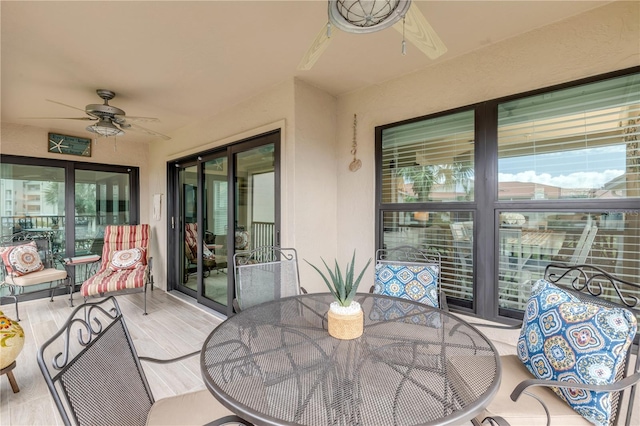 view of patio / terrace featuring ceiling fan