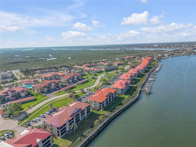 drone / aerial view with a water view