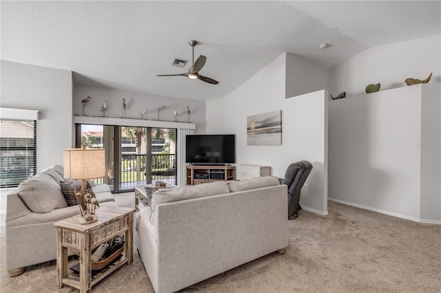 living room with light carpet, a textured ceiling, ceiling fan, and vaulted ceiling